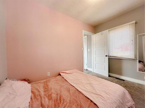 504 1A Avenue East, Brooks, AB - Indoor Photo Showing Bedroom
