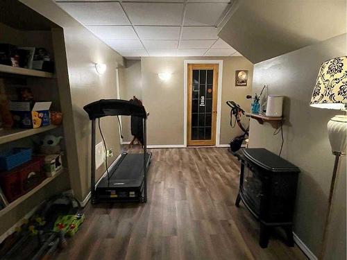 9 Spruce Drive, Drumheller, AB - Indoor Photo Showing Gym Room