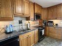 9 Spruce Drive, Drumheller, AB  - Indoor Photo Showing Kitchen With Double Sink 