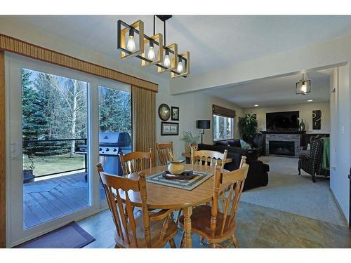 202 Fox Lake Trail, Hanna, AB - Indoor Photo Showing Dining Room With Fireplace