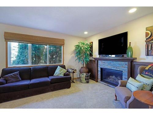 202 Fox Lake Trail, Hanna, AB - Indoor Photo Showing Living Room With Fireplace
