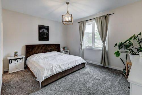 149 10 Avenue Se, Drumheller, AB - Indoor Photo Showing Bedroom