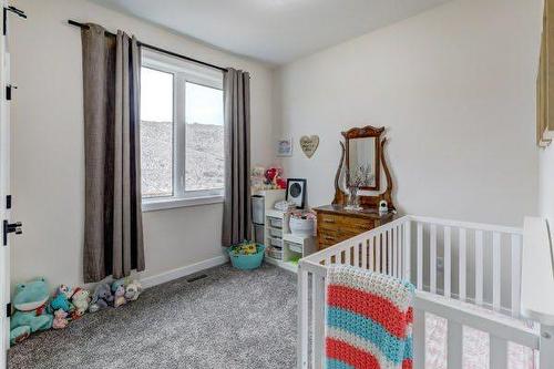 149 10 Avenue Se, Drumheller, AB - Indoor Photo Showing Bedroom