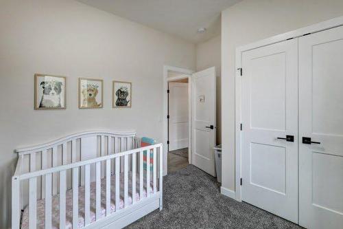 149 10 Avenue Se, Drumheller, AB - Indoor Photo Showing Bedroom