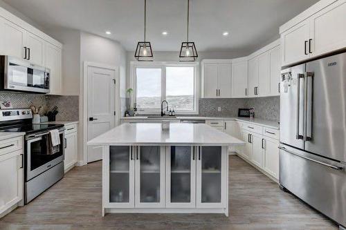 149 10 Avenue Se, Drumheller, AB - Indoor Photo Showing Kitchen With Upgraded Kitchen