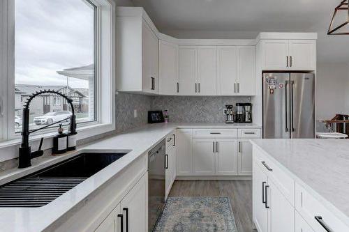 149 10 Avenue Se, Drumheller, AB - Indoor Photo Showing Kitchen With Double Sink With Upgraded Kitchen