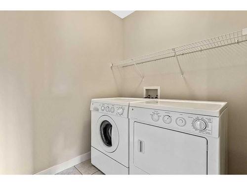 73 Cranleigh Heath Se, Calgary, AB - Indoor Photo Showing Laundry Room