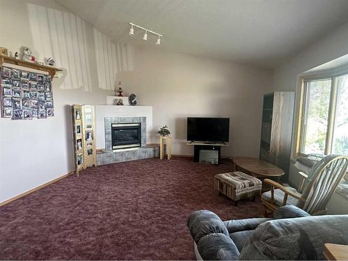 226 1 Avenue North, Delia, AB - Indoor Photo Showing Living Room With Fireplace