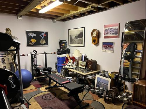 63 Hunts Drive, Drumheller, AB - Indoor Photo Showing Gym Room