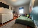 605 6 Avenue East, Drumheller, AB  - Indoor Photo Showing Bedroom 