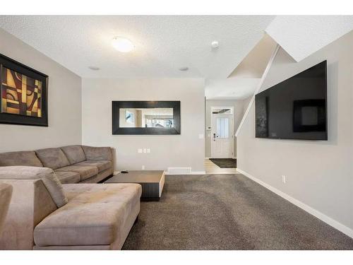 80 Masters Link Se, Calgary, AB - Indoor Photo Showing Living Room