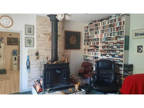 227 6 Street, Drumheller, AB - Indoor Photo Showing Other Room With Fireplace