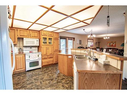 101 Riverside Street, Markerville, AB - Indoor Photo Showing Kitchen With Double Sink