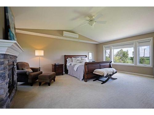 182048 Rge Rd 163, Rural Newell, County Of, AB - Indoor Photo Showing Bedroom With Fireplace