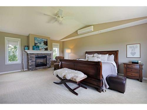 182048 Rge Rd 163, Rural Newell, County Of, AB - Indoor Photo Showing Bedroom With Fireplace