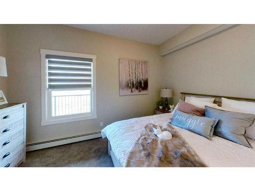 201-499 Meadow Lake Court East, Brooks, AB - Indoor Photo Showing Bedroom