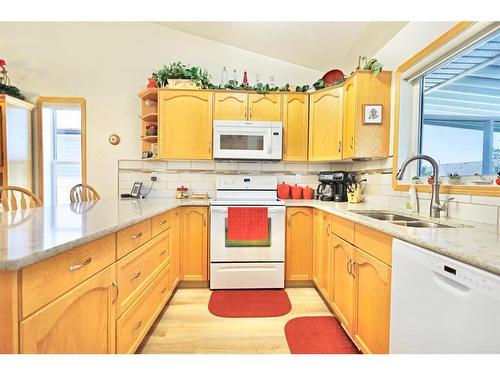 40 Upland Street, Brooks, AB - Indoor Photo Showing Kitchen With Double Sink