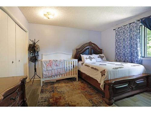 68 Chinook Way West, Brooks, AB - Indoor Photo Showing Bedroom