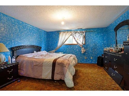 68 Chinook Way West, Brooks, AB - Indoor Photo Showing Bedroom