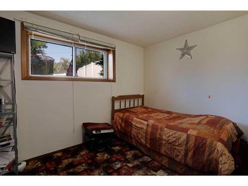 68 Chinook Way West, Brooks, AB - Indoor Photo Showing Bedroom