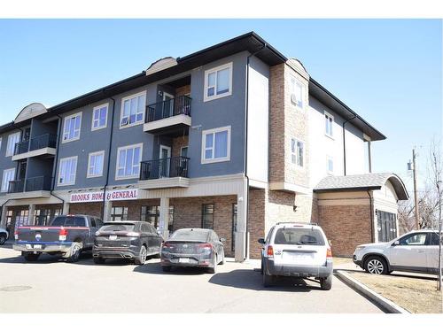 24-330 2 Street West, Brooks, AB - Outdoor With Facade