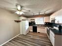 31 Garrow Crescent East, Brooks, AB  - Indoor Photo Showing Kitchen With Double Sink 