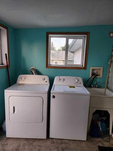 128 Upland Boulevard West, Brooks, AB - Indoor Photo Showing Laundry Room