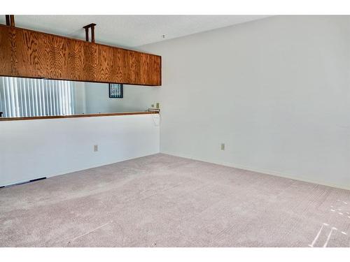 101 22 Street Nw, Drumheller, AB - Indoor Photo Showing Kitchen With Double Sink