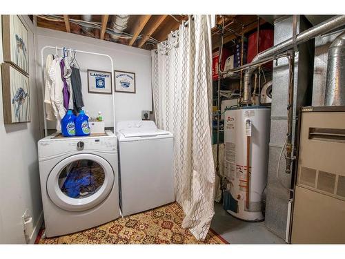 80 Ashwood Road Se, Airdrie, AB - Indoor Photo Showing Laundry Room