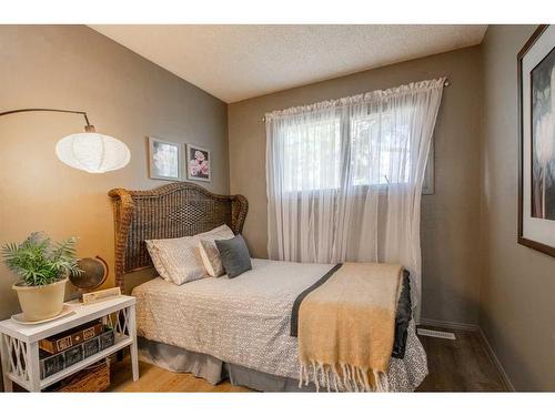 80 Ashwood Road Se, Airdrie, AB - Indoor Photo Showing Bedroom