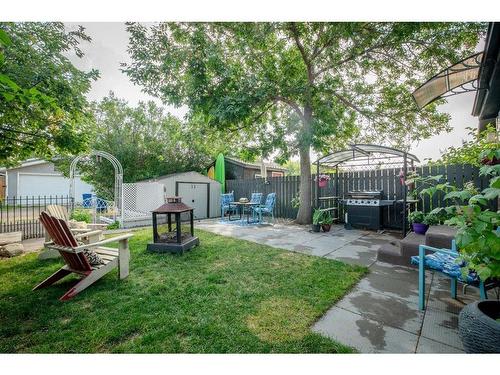 80 Ashwood Road Se, Airdrie, AB - Outdoor With Backyard