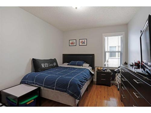 65 Parkland Way East, Brooks, AB - Indoor Photo Showing Bedroom