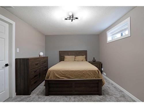 65 Parkland Way East, Brooks, AB - Indoor Photo Showing Bedroom