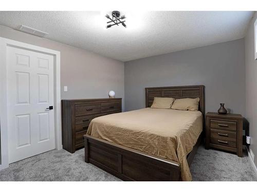 65 Parkland Way East, Brooks, AB - Indoor Photo Showing Bedroom