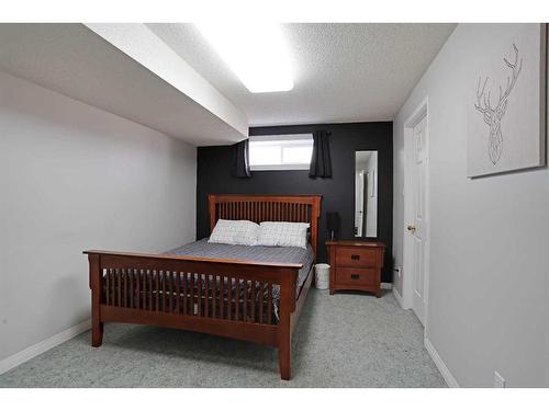 65 Parkland Way East, Brooks, AB - Indoor Photo Showing Bedroom