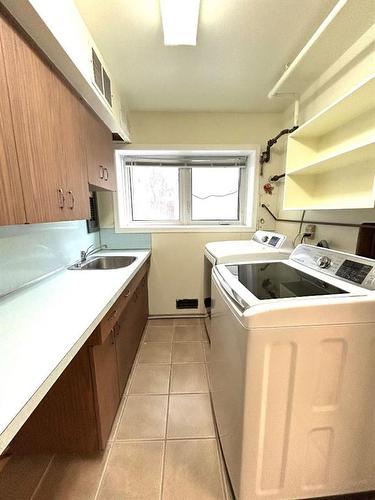 207 2 Avenue East, Oyen, AB - Indoor Photo Showing Laundry Room