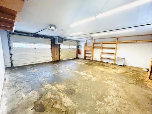 207 2 Avenue East, Oyen, AB - Indoor Photo Showing Garage