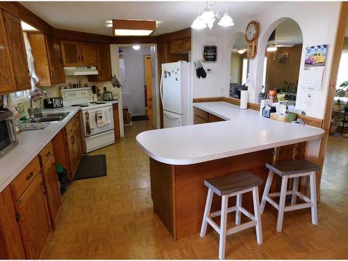 9 151025 Hwy 542, Rural Newell, County Of, AB - Indoor Photo Showing Kitchen With Double Sink