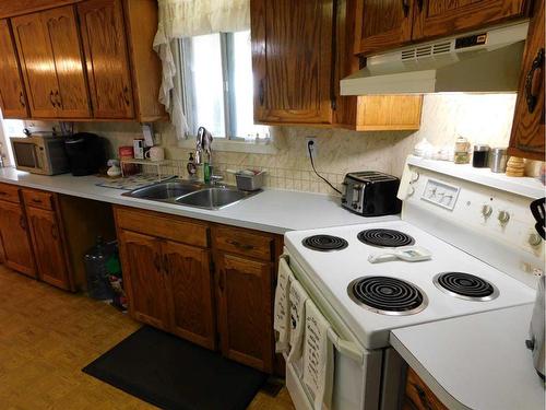 9 151025 Hwy 542, Rural Newell, County Of, AB - Indoor Photo Showing Kitchen With Double Sink