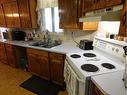 9 151025 Hwy 542, Rural Newell, County Of, AB  - Indoor Photo Showing Kitchen With Double Sink 