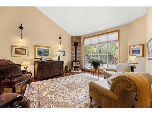 4737 49 Street, Olds, AB - Indoor Photo Showing Living Room With Fireplace