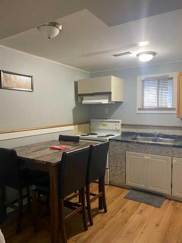 59 Lake Newell Crescent, Brooks, AB - Indoor Photo Showing Kitchen With Double Sink