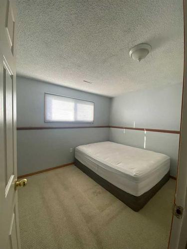 59 Lake Newell Crescent, Brooks, AB - Indoor Photo Showing Bedroom