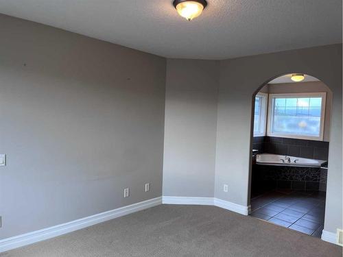 122 Coopers Bay Sw, Airdrie, AB - Indoor Photo Showing Other Room