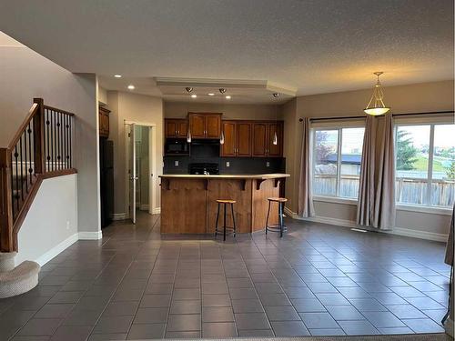 122 Coopers Bay Sw, Airdrie, AB - Indoor Photo Showing Kitchen