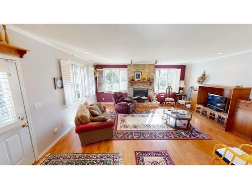 525 8 Avenue, Bassano, AB - Indoor Photo Showing Living Room With Fireplace