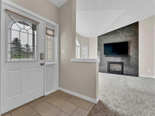 66 White Pelican Court, Lake Newell Resort, AB - Indoor Photo Showing Other Room With Fireplace