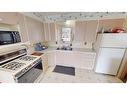 518 4 Avenue, Bassano, AB  - Indoor Photo Showing Kitchen With Double Sink 