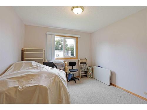 44 Greenbrook Way East, Brooks, AB - Indoor Photo Showing Bedroom