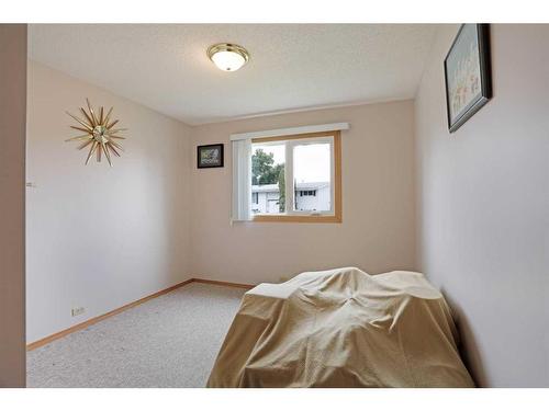 44 Greenbrook Way East, Brooks, AB - Indoor Photo Showing Bedroom